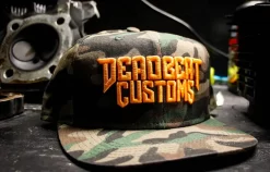Deadbeat Customs Hunter Orange/Camo Snapback -Next stop, Motorcycle riding. deadbeat customs hunter orangecamo snapback 79758.1697659093